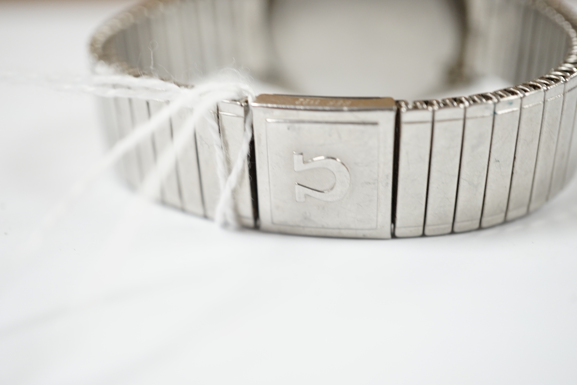 A gentleman's stainless steel Omega manual wind wrist watch, with date aperture, on associated flexible strap, case diameter 35mm, no box or papers.